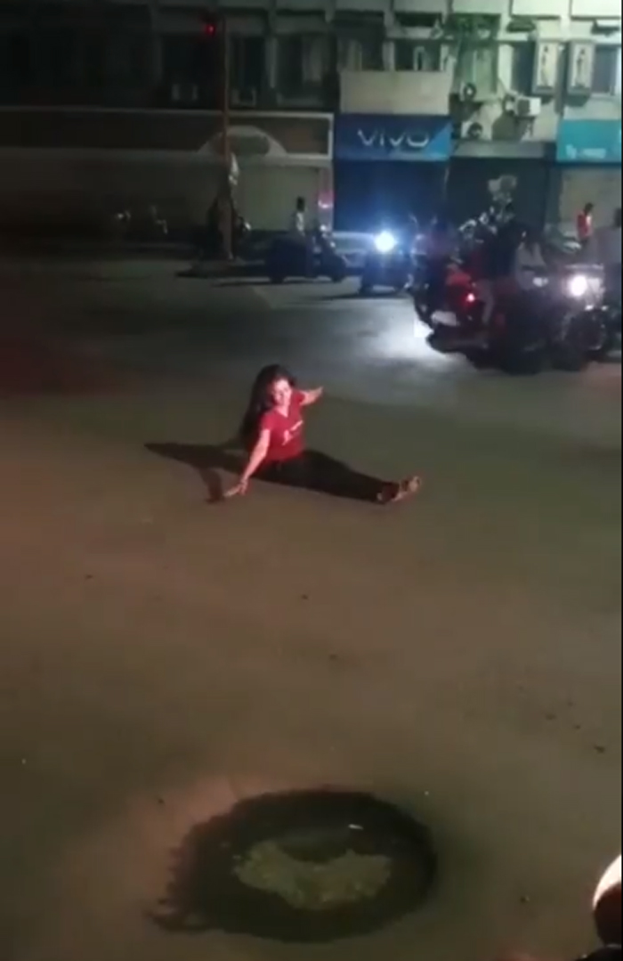 drunk-girl-did-yoga-on-road